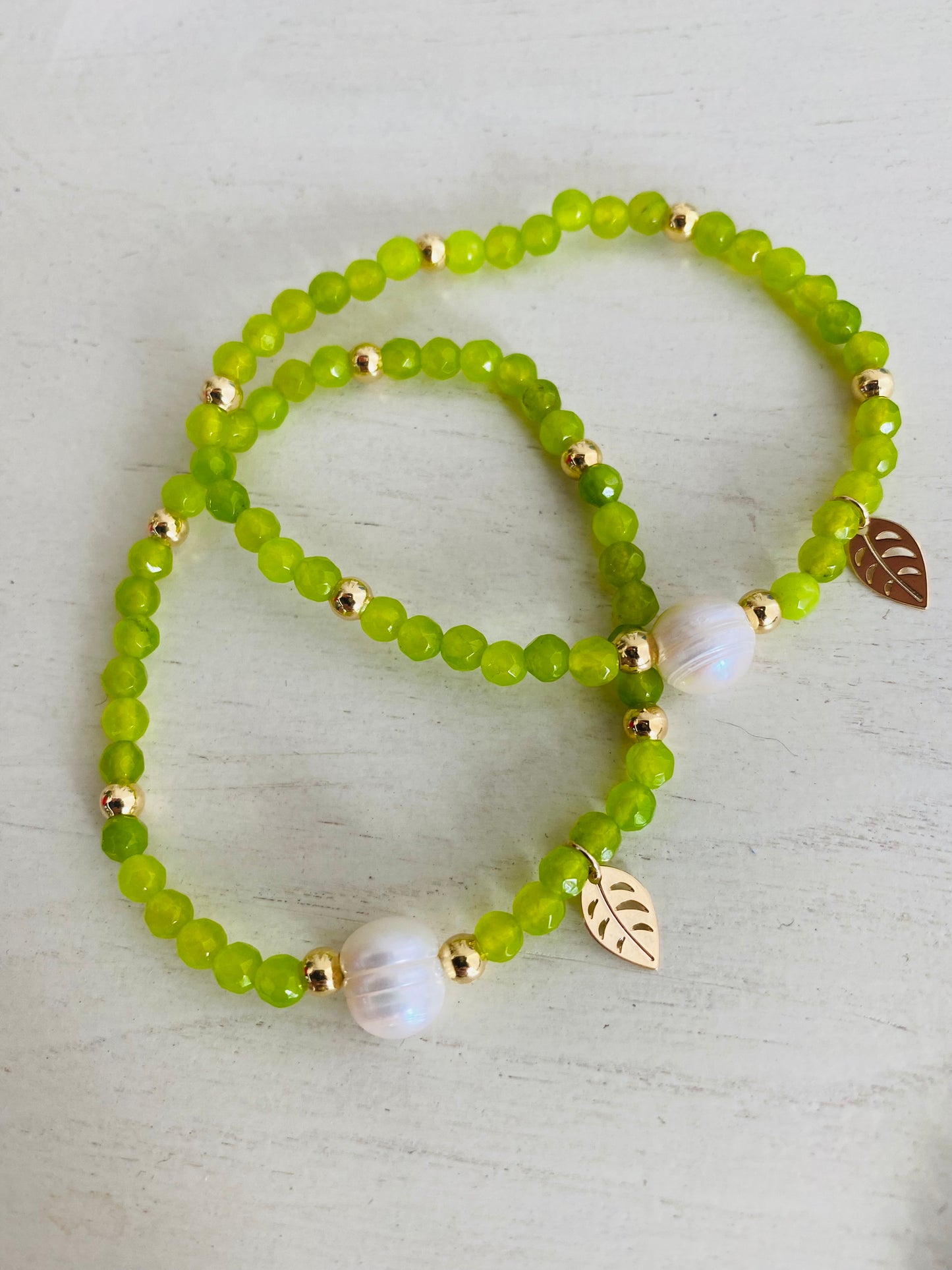 Light Green  tiny beads bracelet with gold mini leaf charm